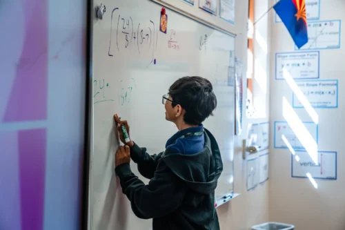 An eighth grader works on an algebra problem at Southwest Junior High School in San Luis, Ariz., in a class that is part of an early-college program for high-achieving students.
